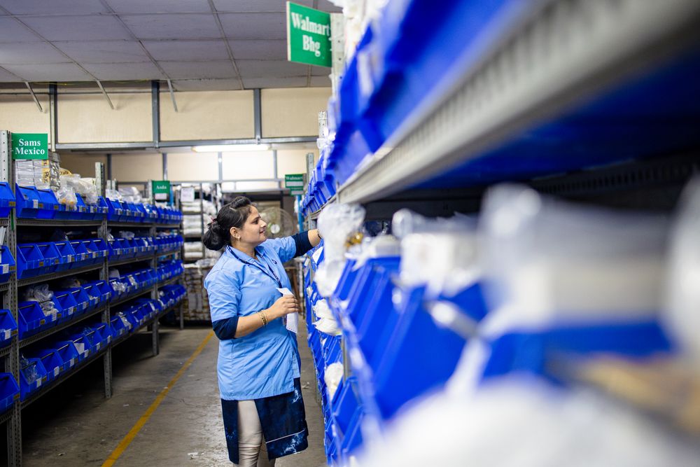 Warehouse operator at racking